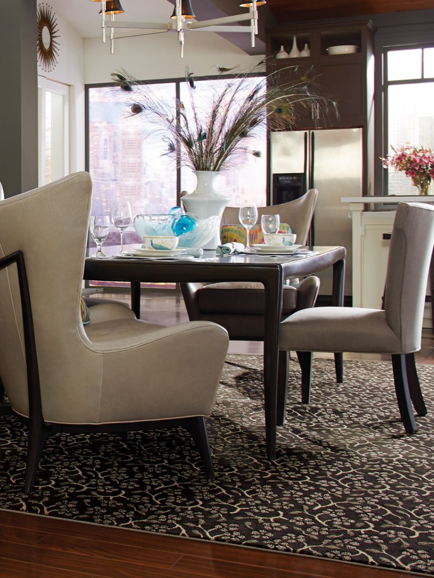 A front door opening to luxury vinyl floors